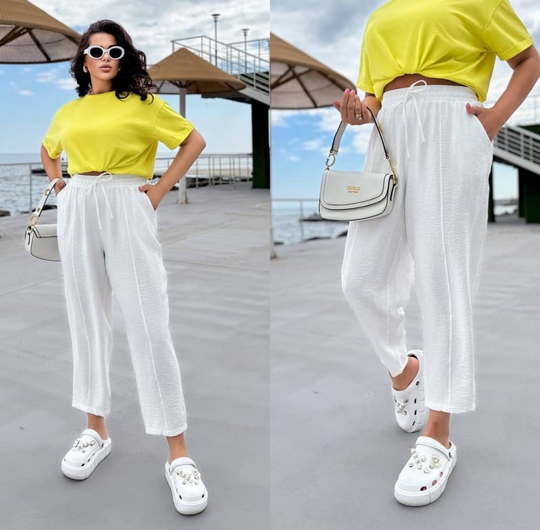 White linen pants look good in this look