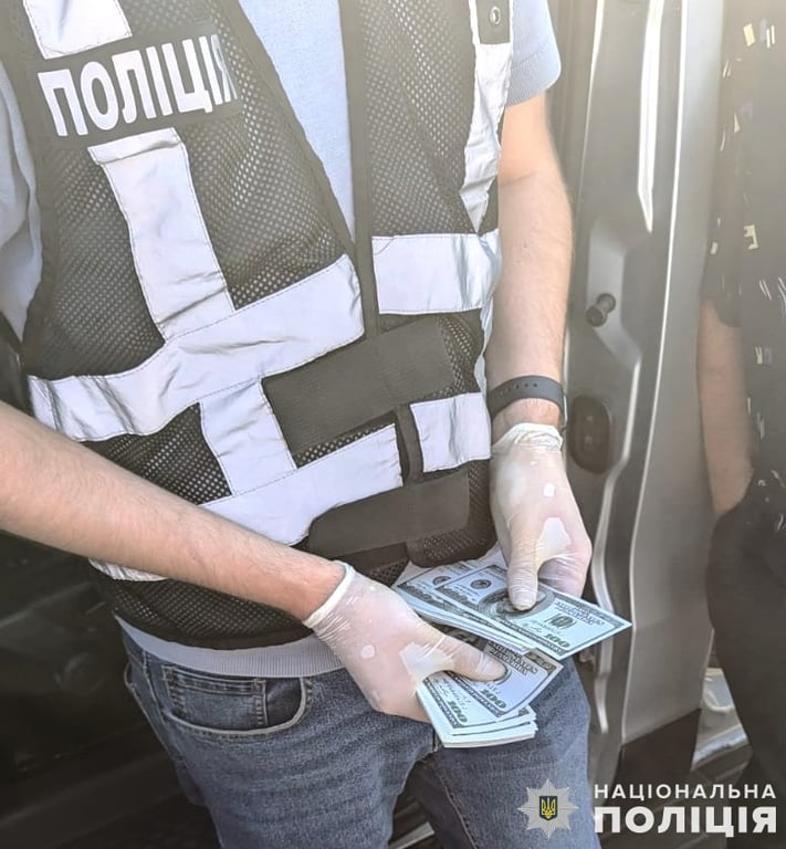 Вилучені кошти. Фото: поліція Львівської області