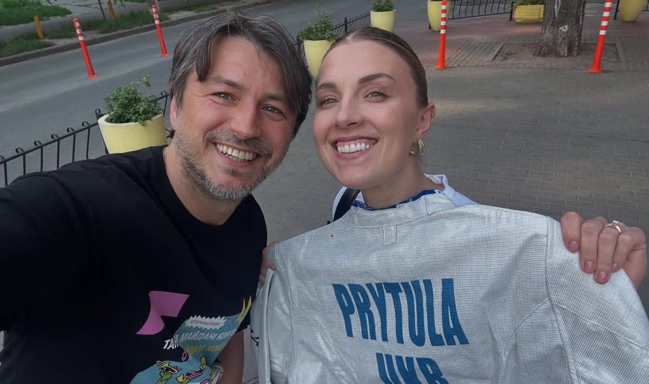 Волонтер Сергей Притула и фехтовальщица Ольга Харлан