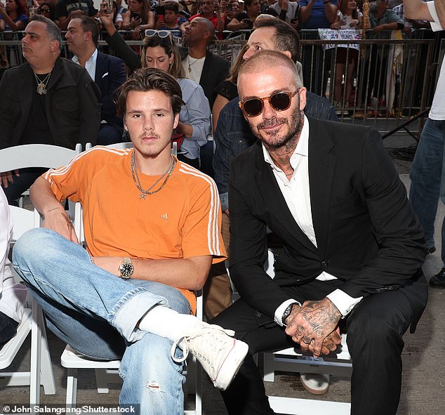 Футболіст Девід Бекхем з сином Крузом. Фото: Shutterstock