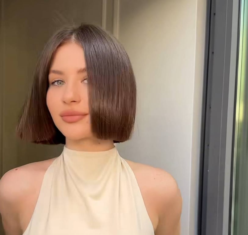 The bob is often styled with a central parting