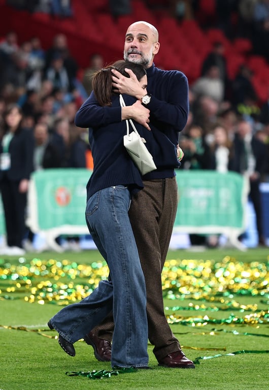 Мария и Хосеп Гвардиола после победы Манчестер Сити над Арсеналом