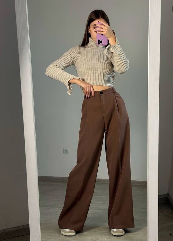 Обирайте штани з високою посадкою у 2025 році