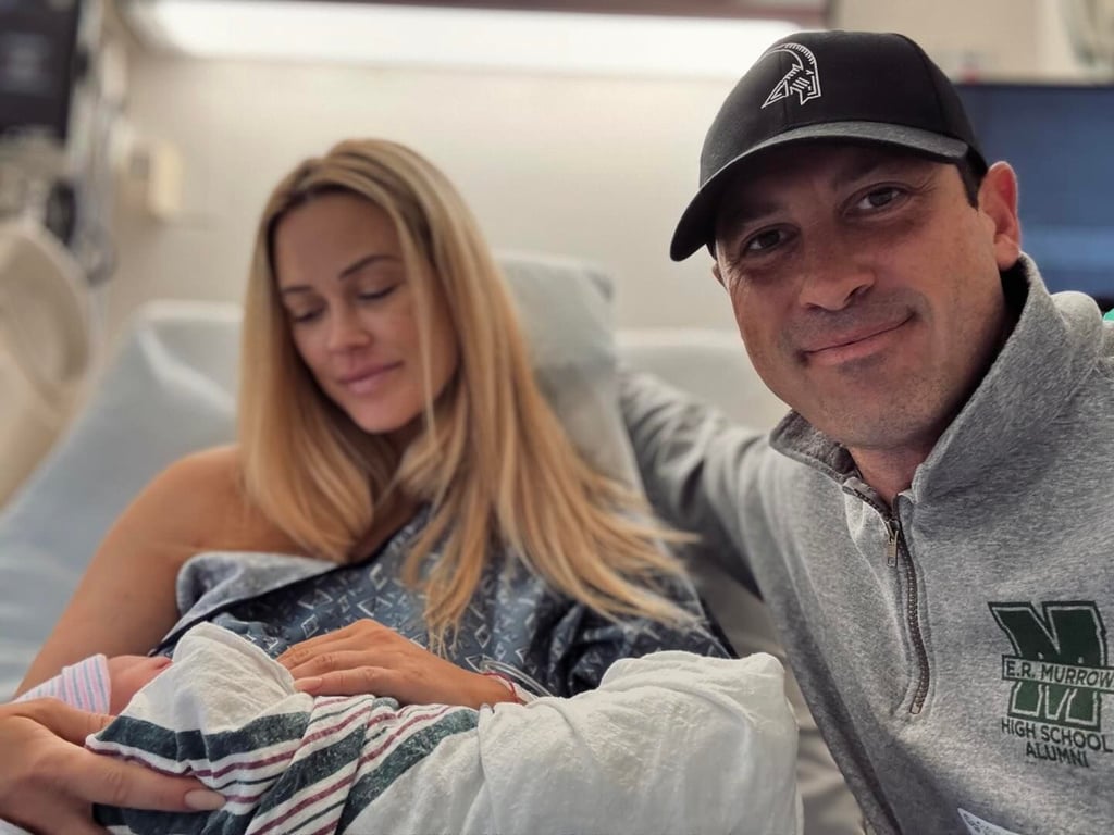 Пета Маргатройд та Макс Чмерковський з третім сином