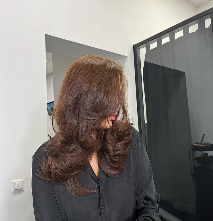 Багатошарова стрижка має ідеальний вигляд завжди