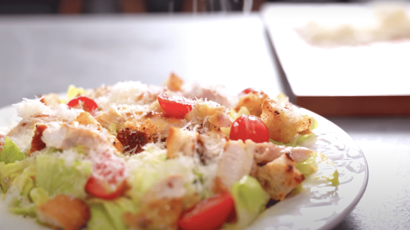 classic recipe for Caesar salad with chicken and sauce