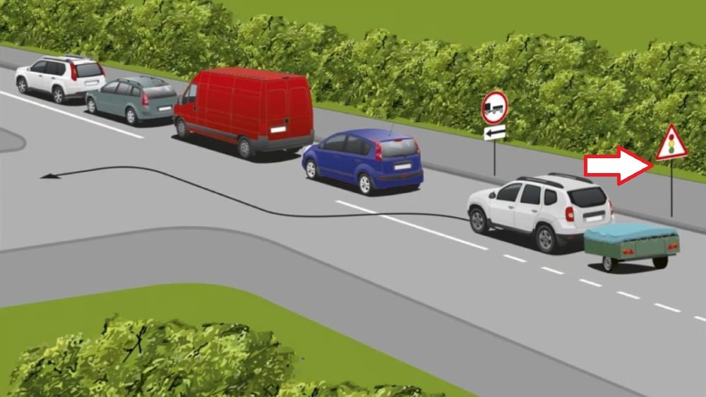 ПДР тест з каверзою — чи може водій легковика з причепом повернути ліворуч - фото 2