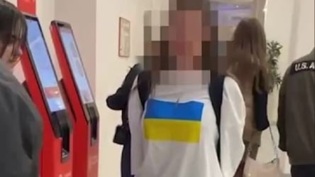 Через футболку з українським прапором у Москві напали на дівчину - 285x160