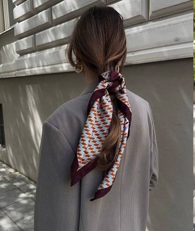 You can safely tie the scarf in your hair
