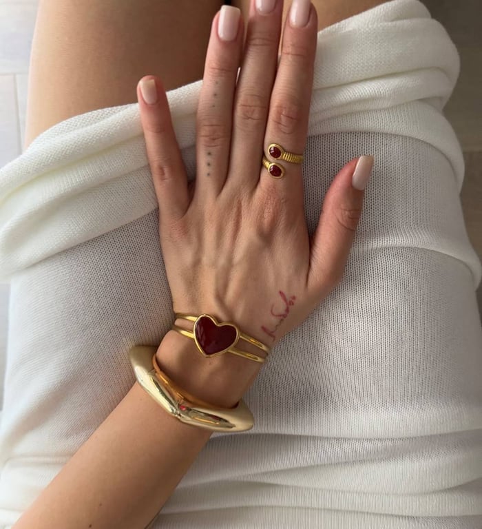 Massive bracelets are in fashion, and they can be worn in different ways.