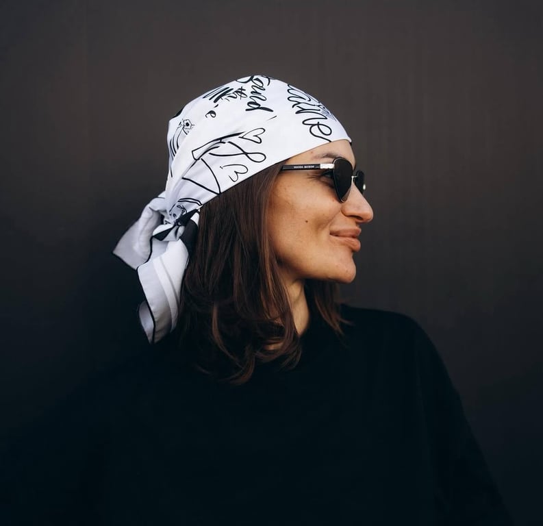 The scarf can be tied like a bandana, and it will look daring