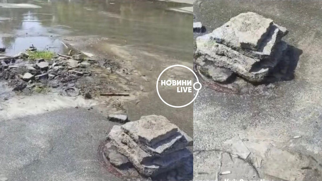 В Киеве посреди дороги забил фонтан - его прикрыли камнями