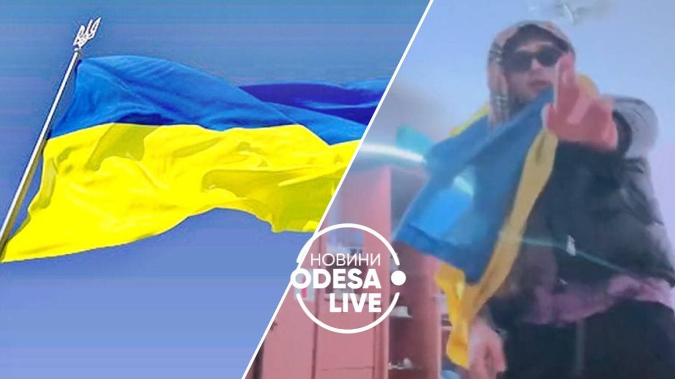Блогер Евгений Ткаленко потоптался на флаге Украины