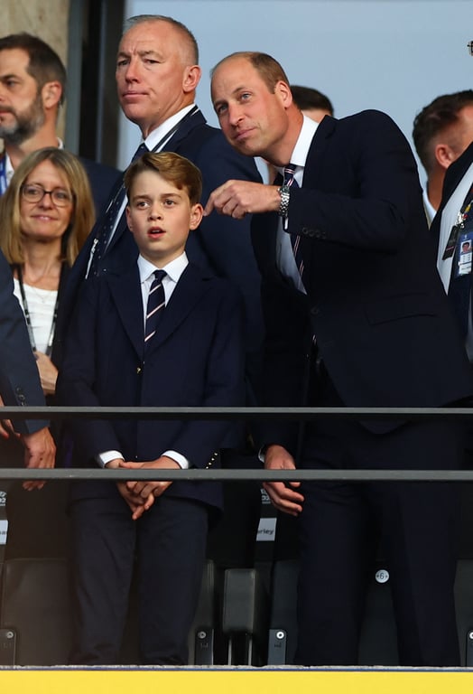 Принц Джордж з принцом Вільямом. Фото: Reuters