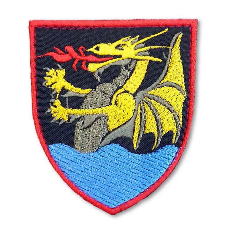 Дракон с огнем на шевроне артиллеристов