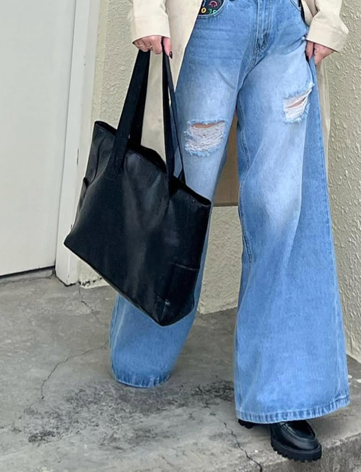 Яке взуття пасує до широких джинсів