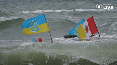 В Одессе на Ланжероне "моржи" устроили заплыв с флагами — подробности - 285x160