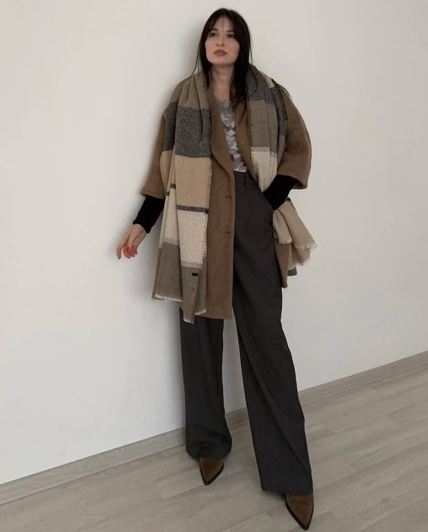 A large scarf successfully complements many looks