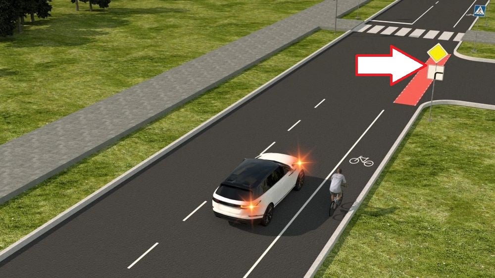 Швидкий тест з ПДР — чи повинен водій автомобіля дати дорогу велосипедисту - фото 2