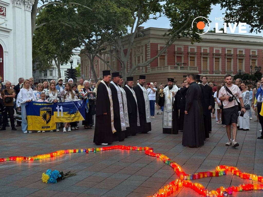 священники