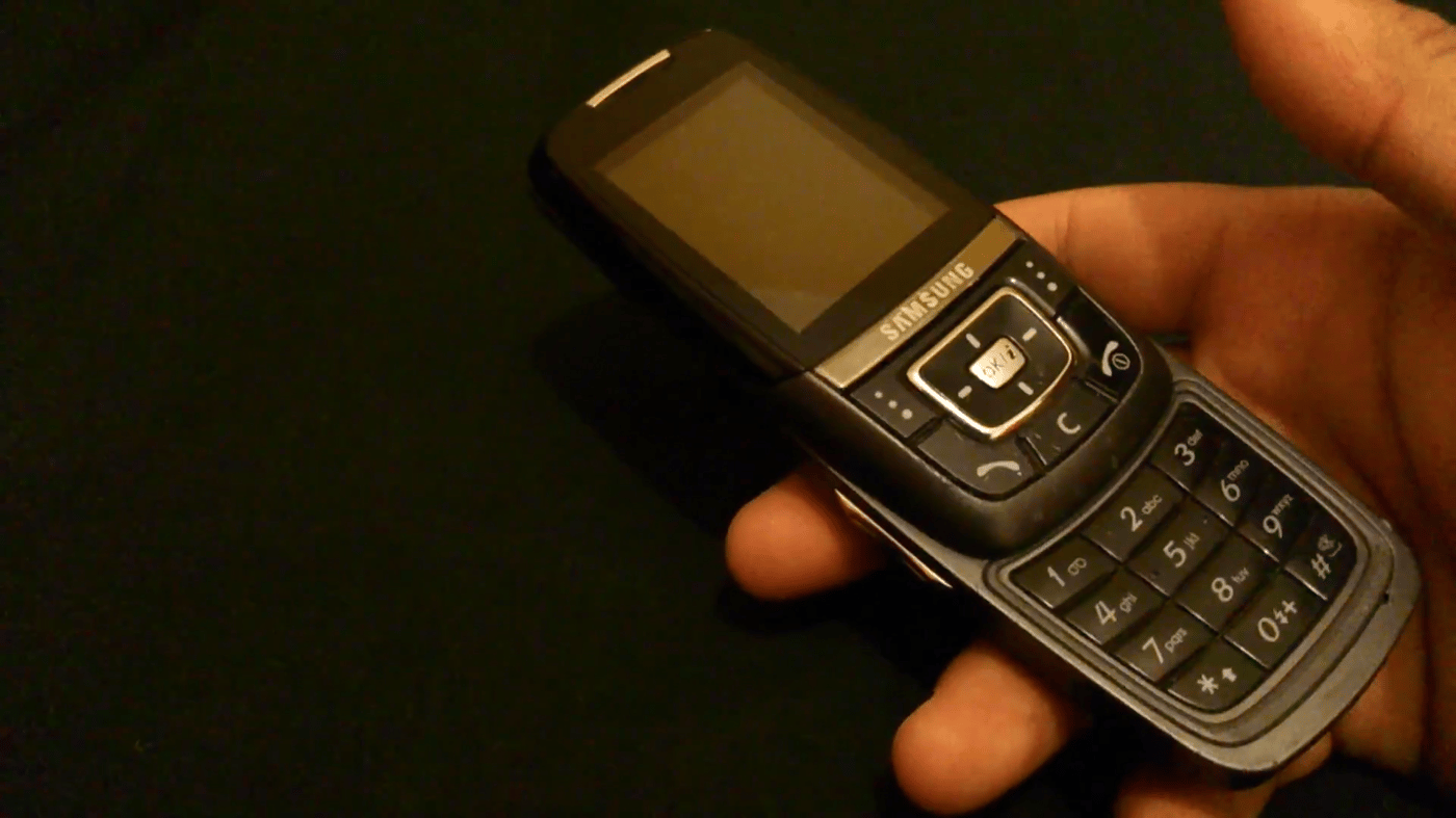 Samsung D600E push-button slider phone