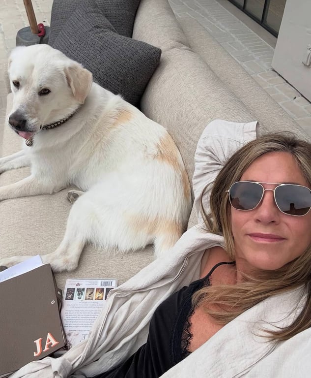 Aniston adores her dogs