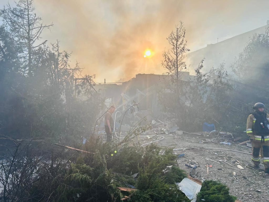 A column of black smoke over the city after a bomb hit Dobropillia