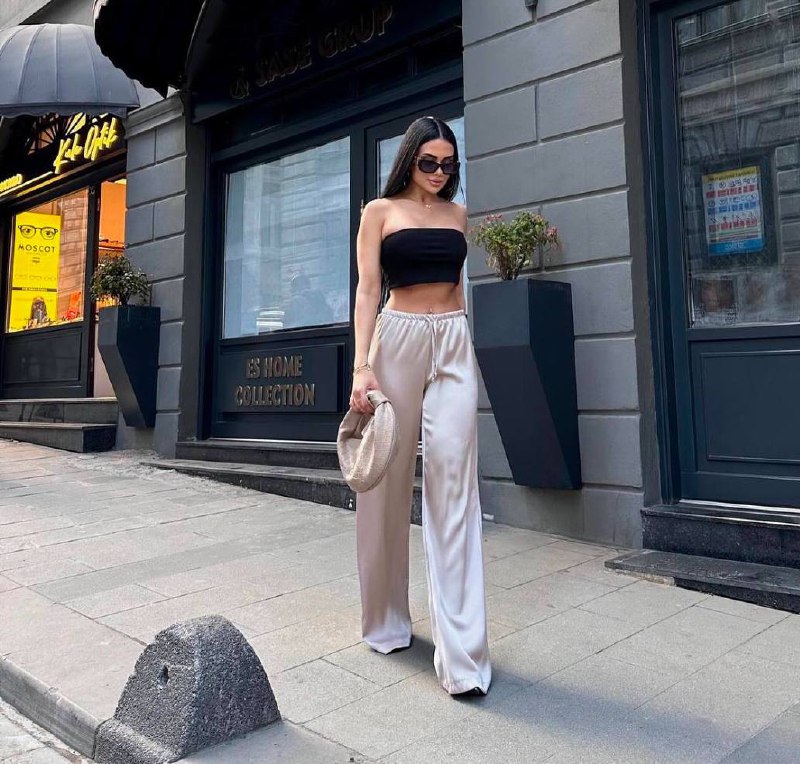 Шовкові штани кремового кольору мають елегантний вигляд