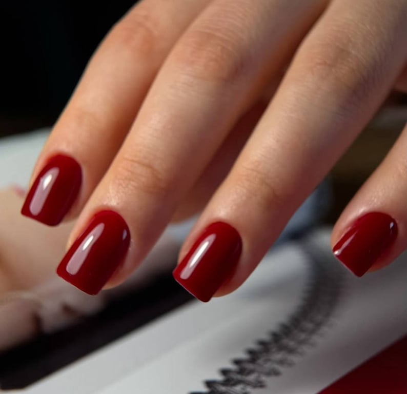 Cherry shade on nails will always be appropriate