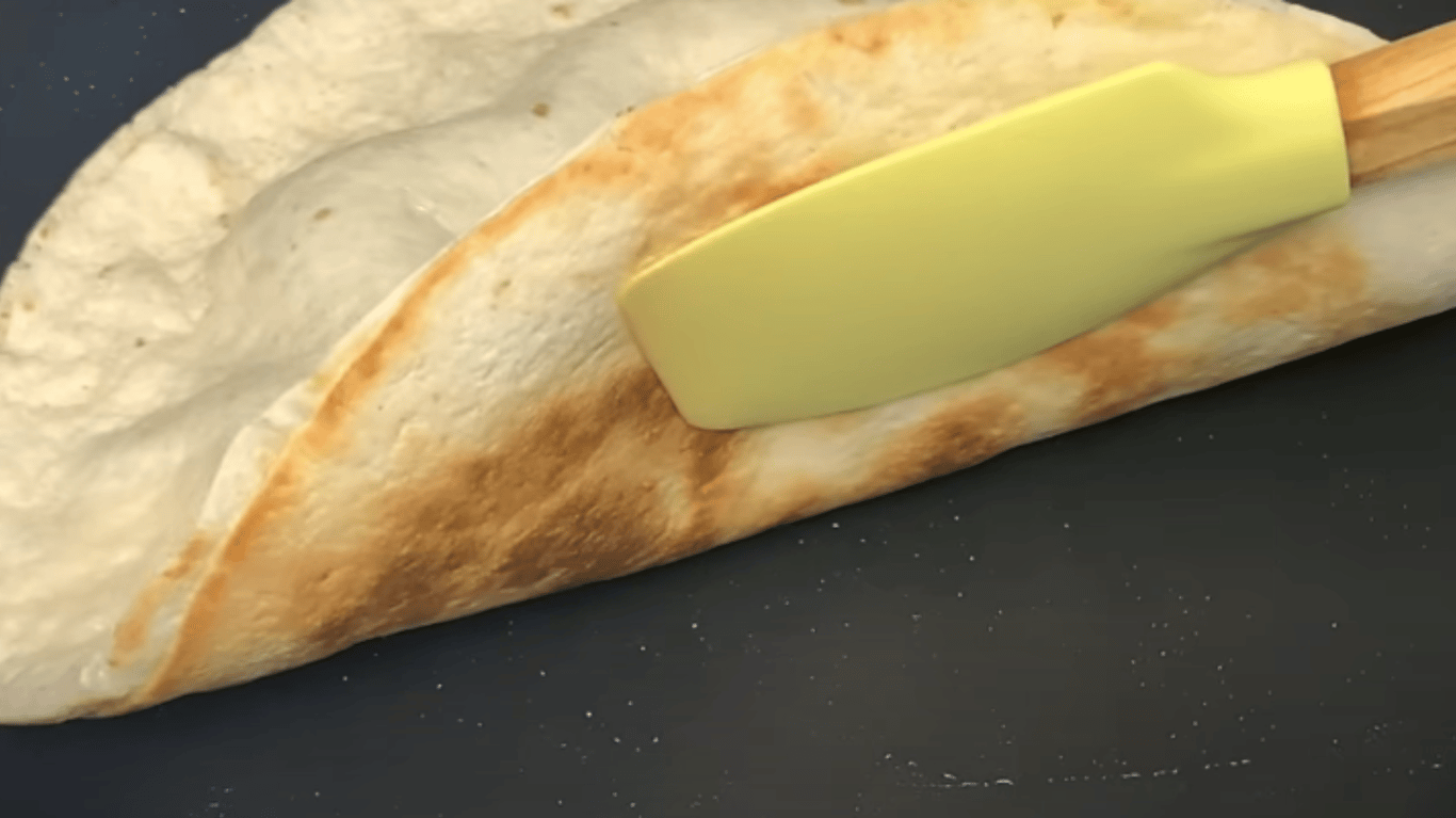 the pizza-like breakfast that requires 2 eggs and pita bread