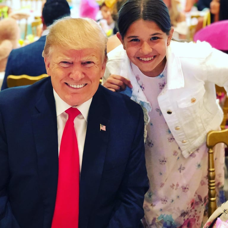 Дональд Трамп та його онучка Кай