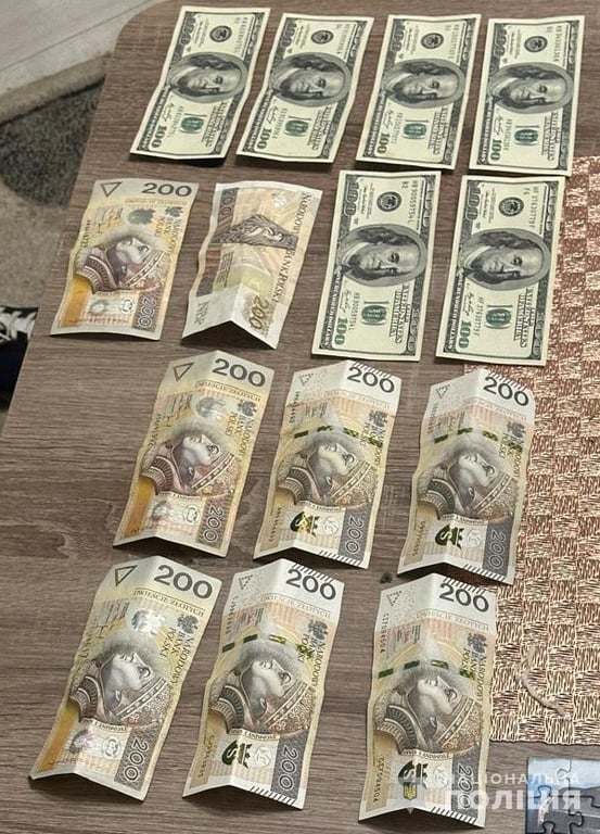 Изъятые деньги. Фото: Национальная полиция Украины