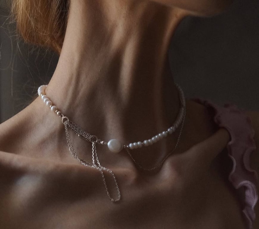 A necklace that will not compete with the overall look