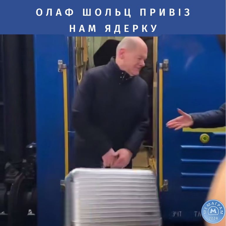 Мем про валізу Олафа Шольца