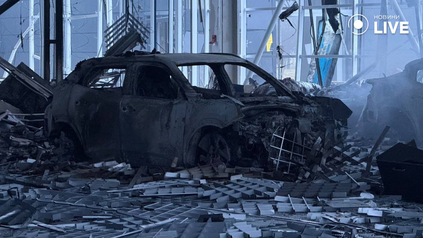 Атака на автосалон 13 лютого