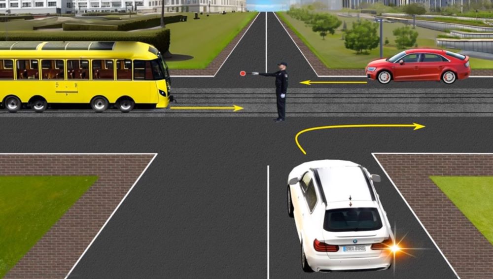 Эти сигналы должен знать каждый водитель - кому позволяет продолжить движение регулятор - фото 1