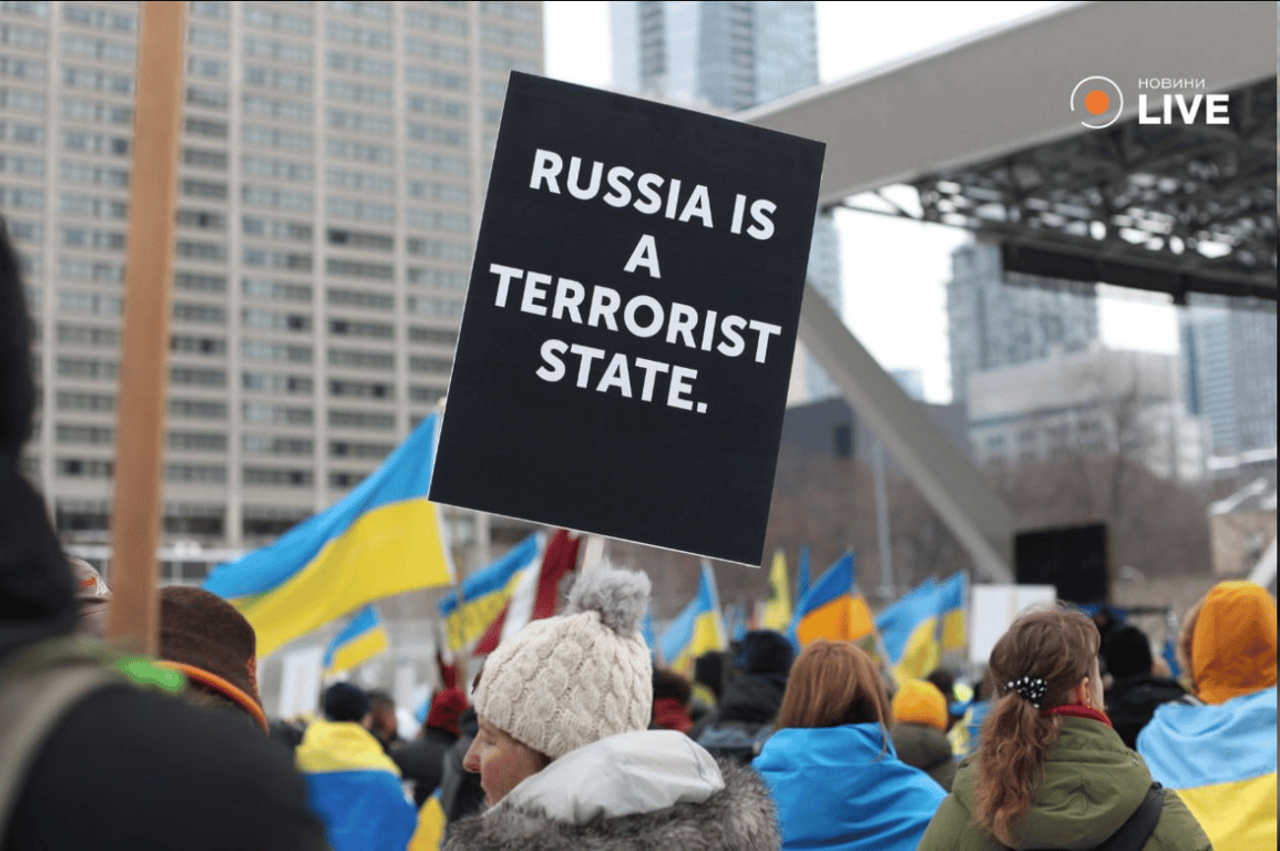 У Торонто пройшла акції до річниці війни в Україні —фоторепортаж - фото 2
