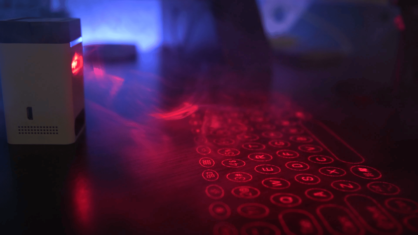 Проэкция лазерной клавиатуры на столе