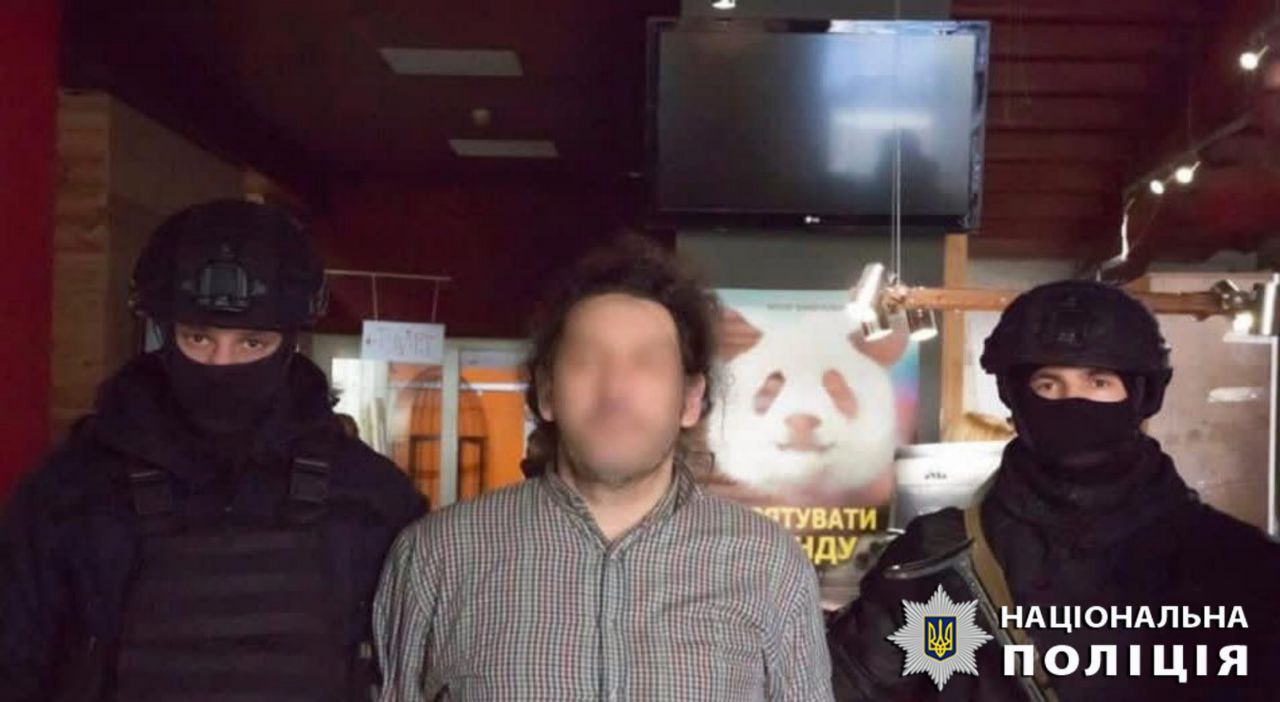 затримання фотографа