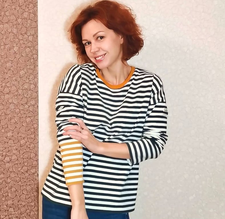 Полоска в одежде выглядит довольно сдержанно.