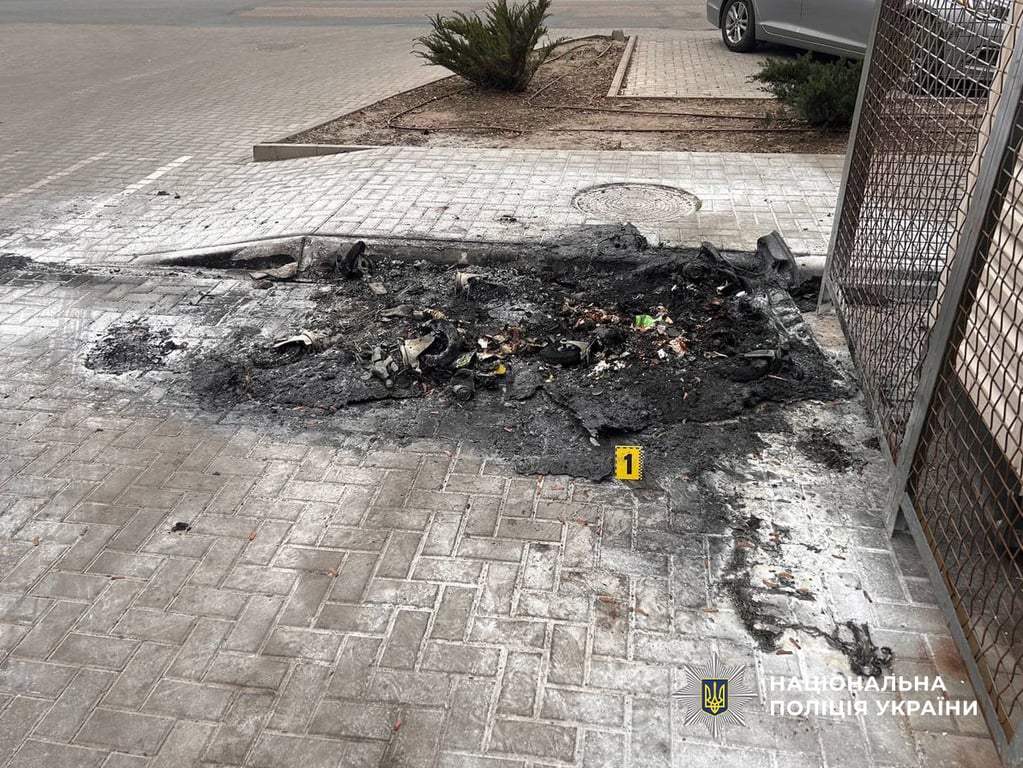 Попіл на асфальті