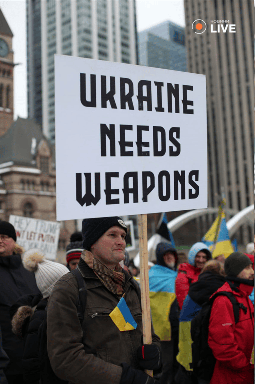 У Торонто пройшла акції до річниці війни в Україні —фоторепортаж - фото 5